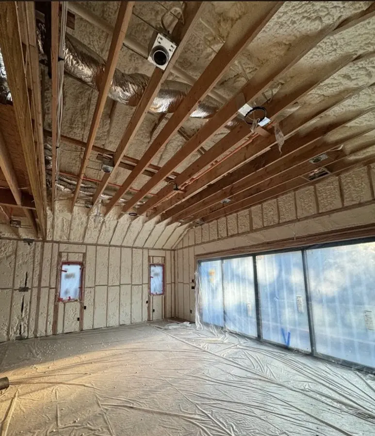 Interior walls and ceiling insulated with spray foam during new construction in Lake Dallas